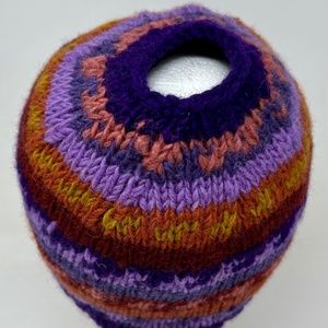 knit beanie ponytail hat wool Ganesh Himal